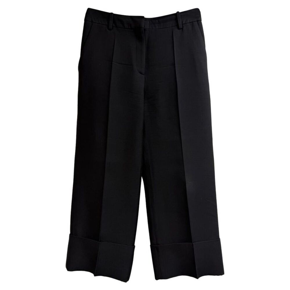 Valentino Garavani Pleated Cuffed Hem Trousers in Black Wool